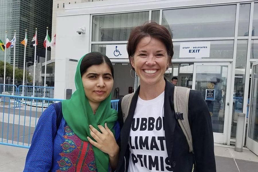 Bernadette Woods Placky standing with Malala Yousafzai outside the United Nations building in New York